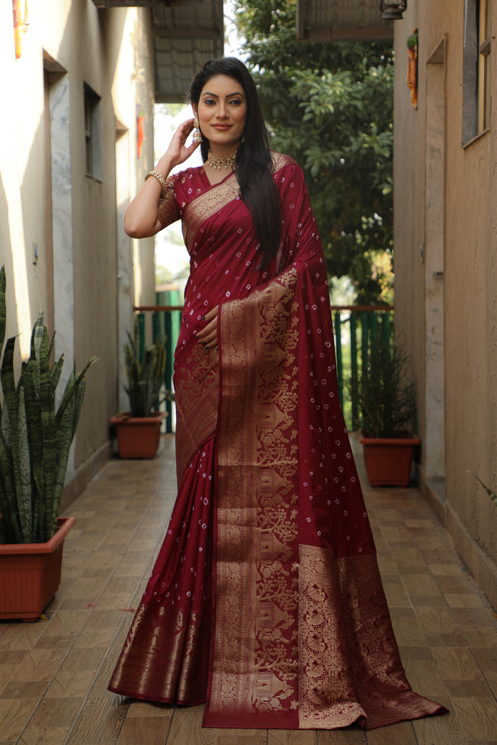 Maroon Kanjivaram silk saree with intricate pallu and exquisite design, perfect for grand celebrations.