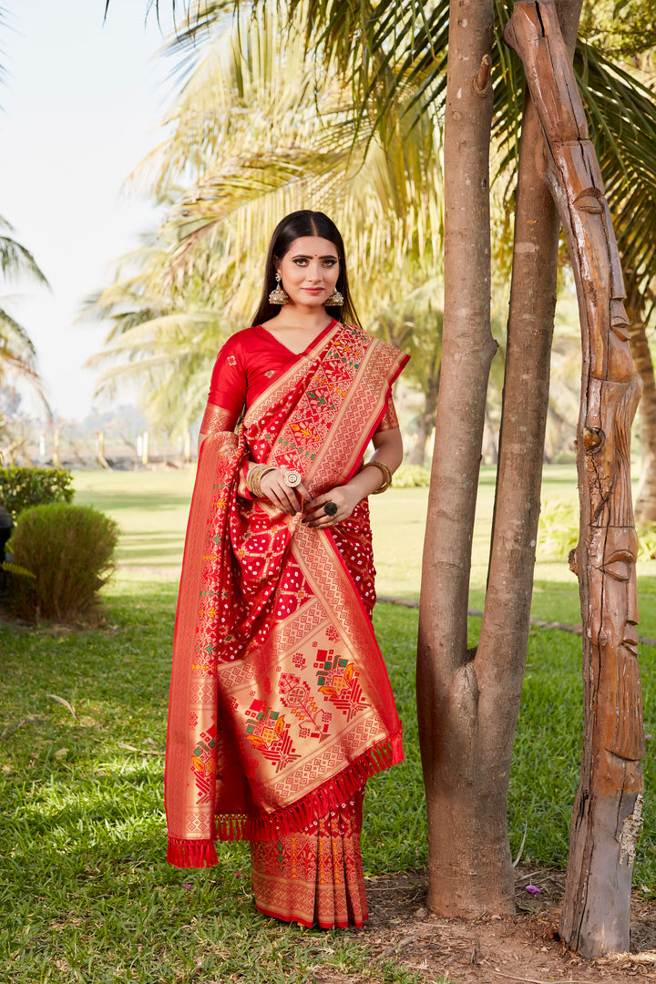 Blue Gharchola Bandhej silk saree with intricate zari weaving and meenakari borders, perfect for festive and traditional occasions.