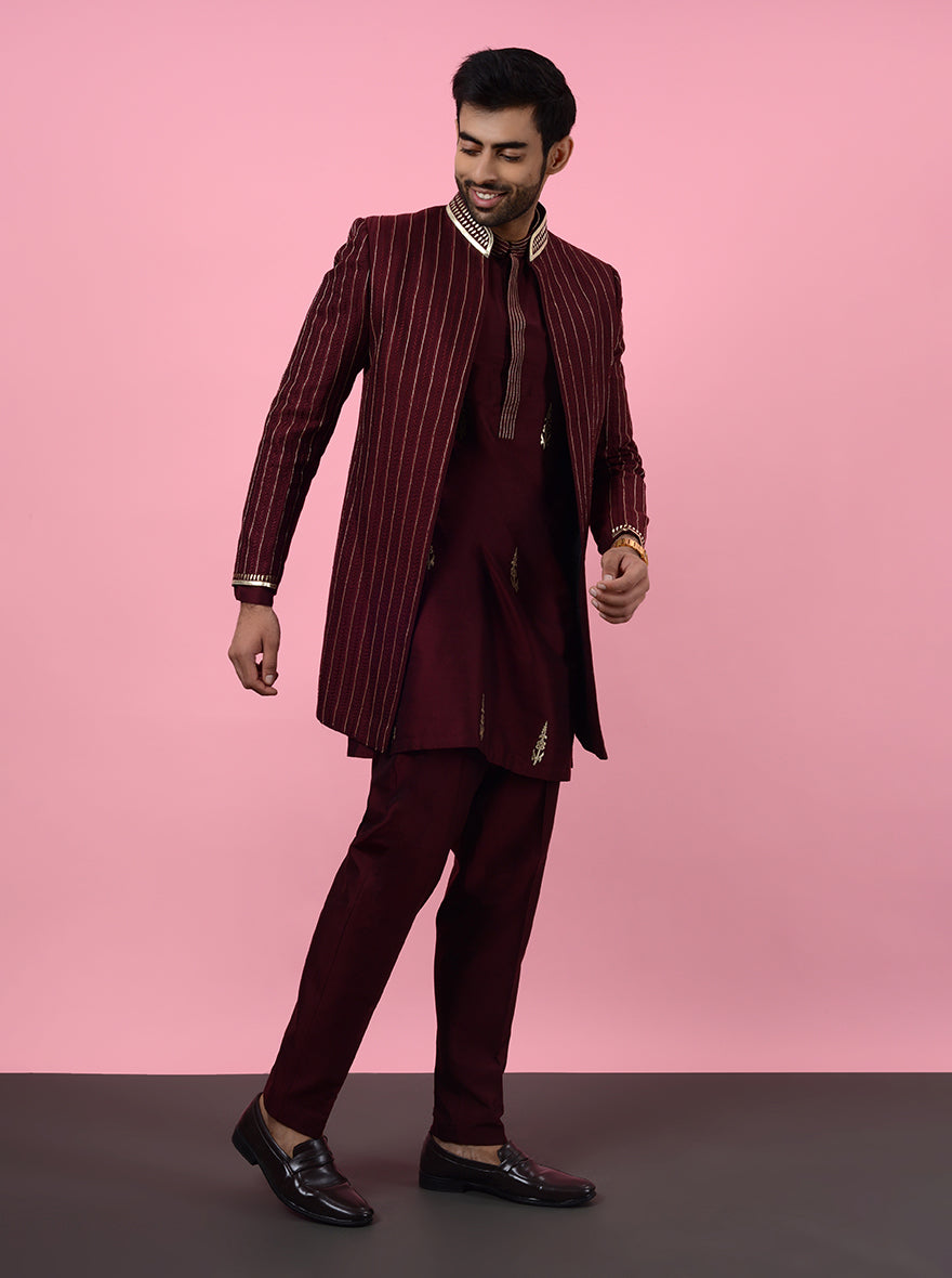 Shine at any event in this Wine Indowestern, crafted from luxurious Silk Blend and featuring elegant kasab embroidery, perfect for the USA's fashion-forward audience.