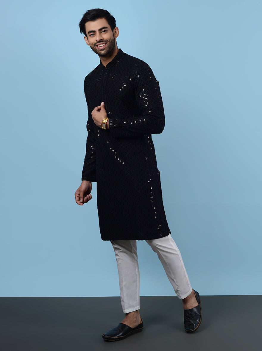 Elevate your ethnic wardrobe with this stylish Black Kurta Pajama for special occasions.