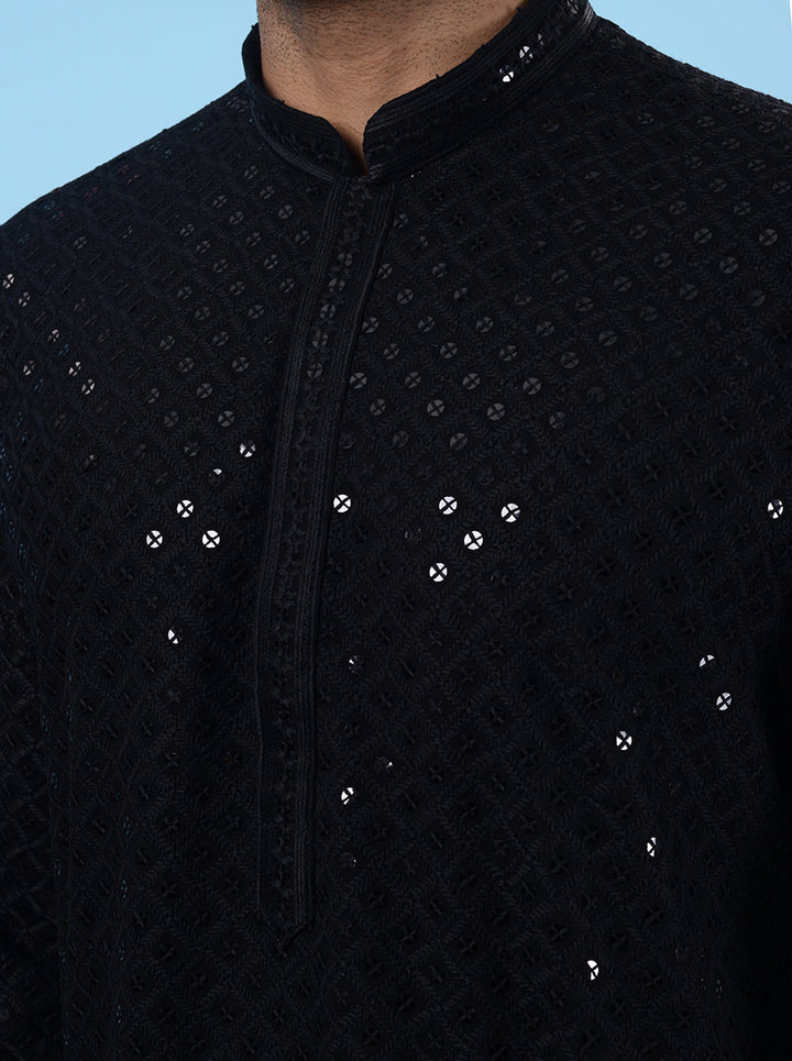 Ideal for festive gatherings, this Black Kurta Pajama adds sophistication to your look.