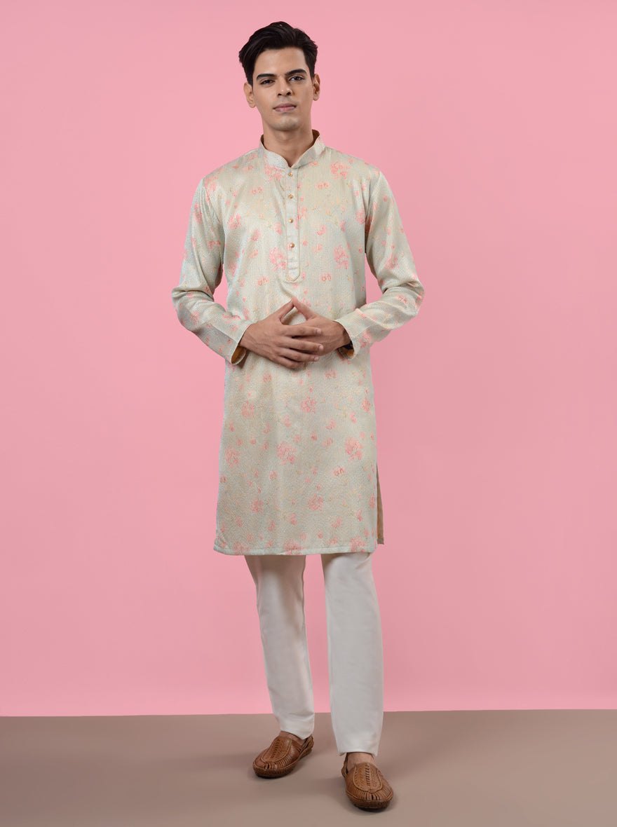 Stylish cream and blue kurta pajama in silk blend, featuring elegant prints perfect for celebrations in the USA.