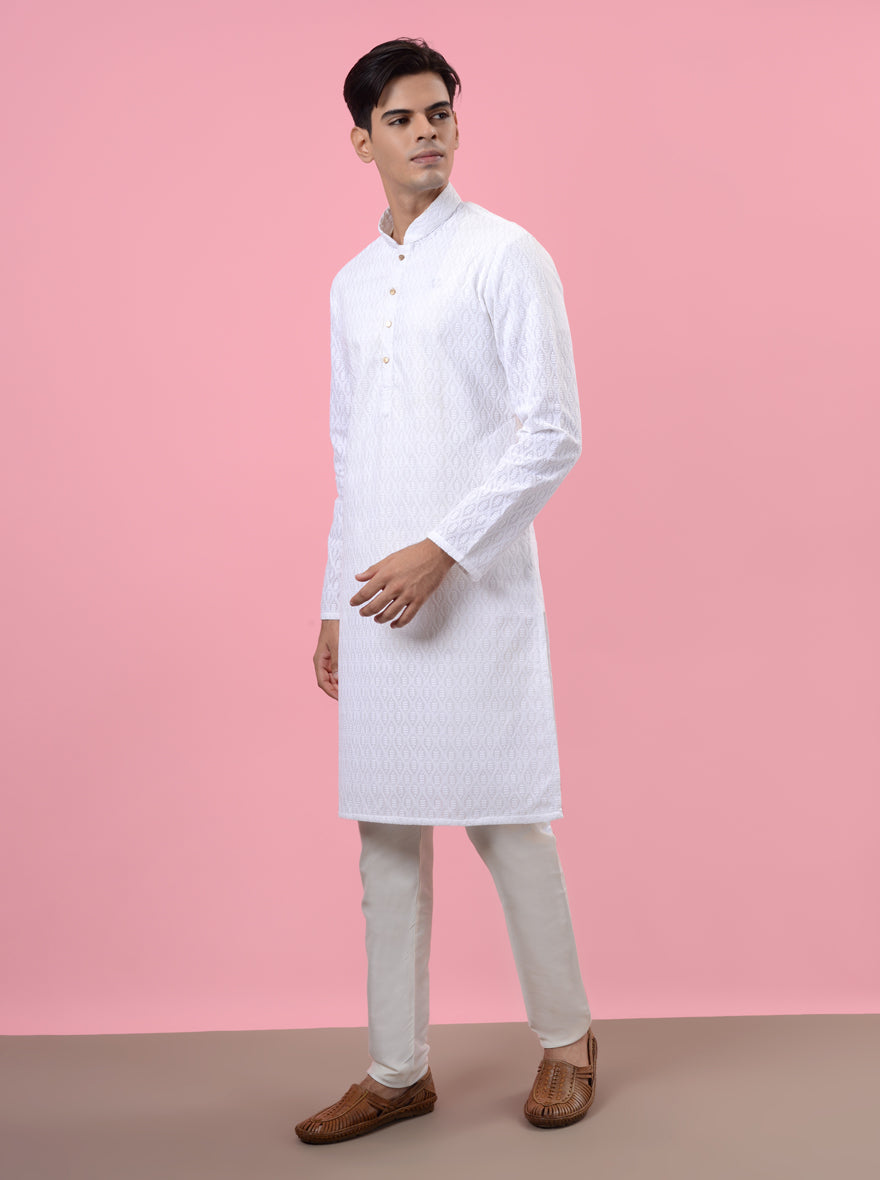 Chic white kurta pajama crafted from silk blend, ensuring timeless elegance for your festive wardrobe in the USA.