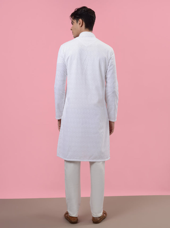 Classic white kurta pajama for men, showcasing a silk blend and bold embroidery for festive occasions in the USA.