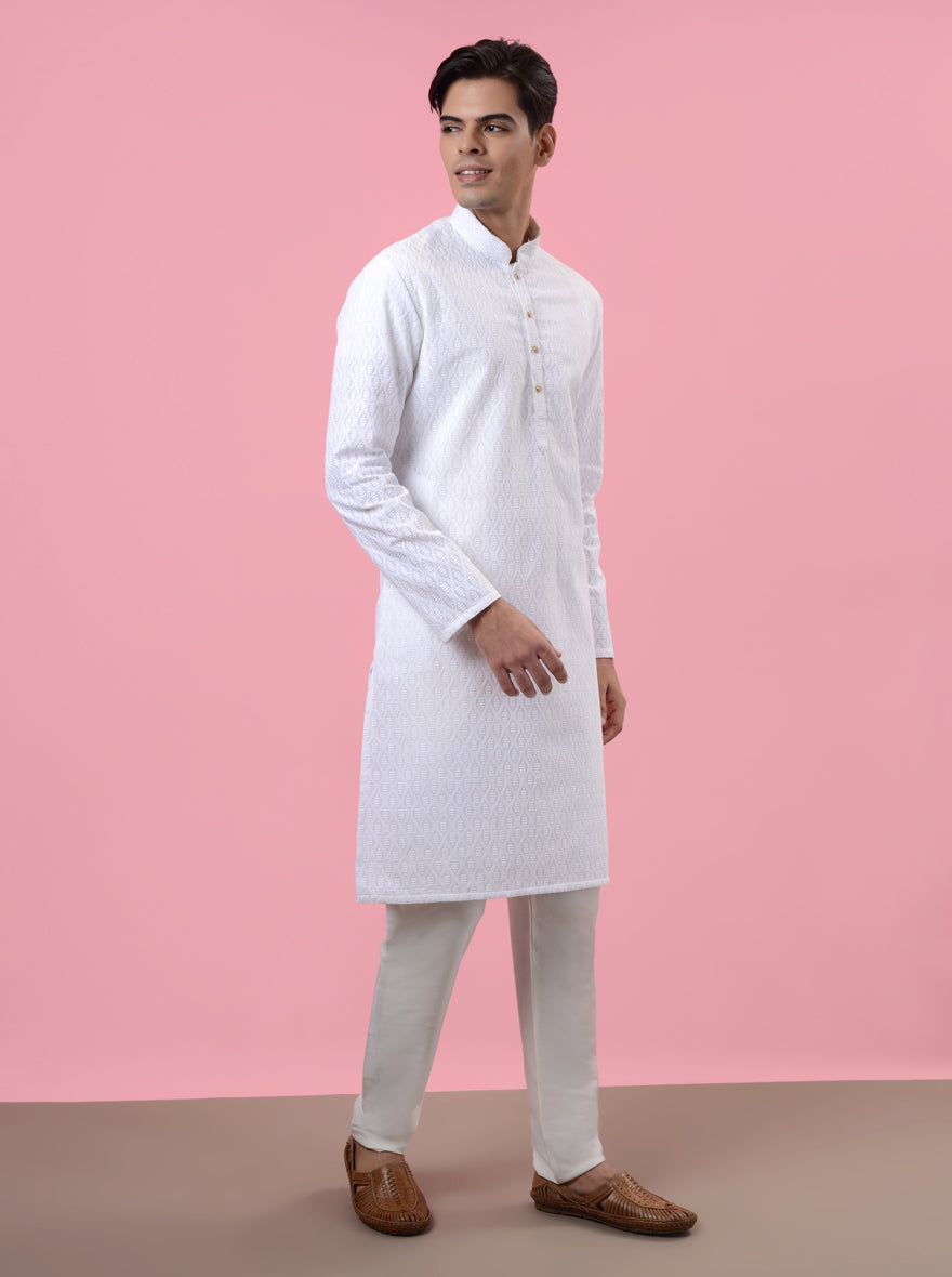 Comfortable white kurta pajama in silk blend, perfect for special events and gatherings in the USA with exquisite embroidery.