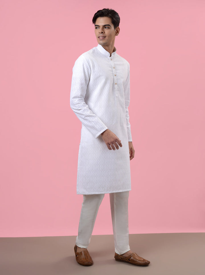 Comfortable white kurta pajama in silk blend, perfect for special events and gatherings in the USA with exquisite embroidery.