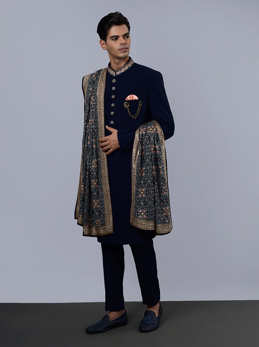 Shine at your next event in the USA wearing this navy-blue Indo Western designed for modern men with intricate embroidery.