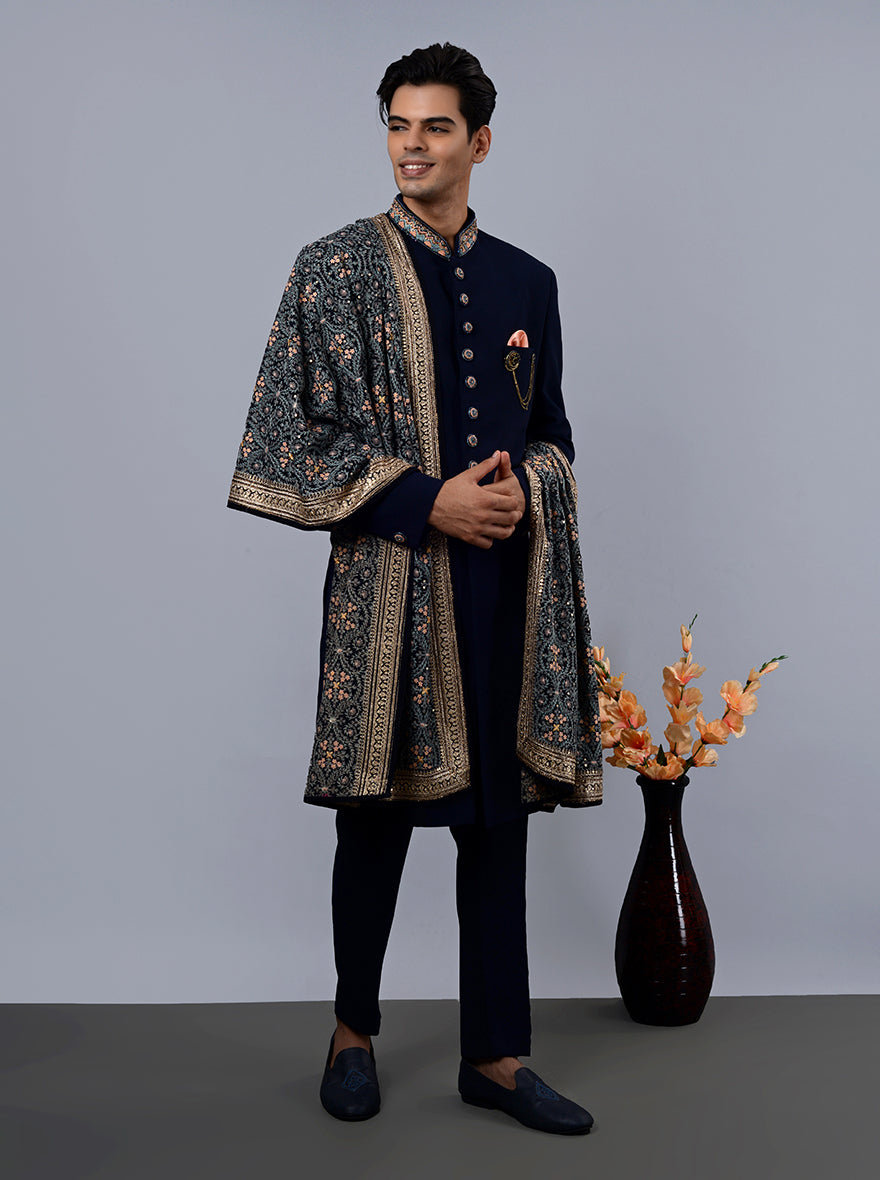 Elevate your festive look with this navy-blue Indo Western, crafted from poly fabric, ideal for weddings and celebrations.