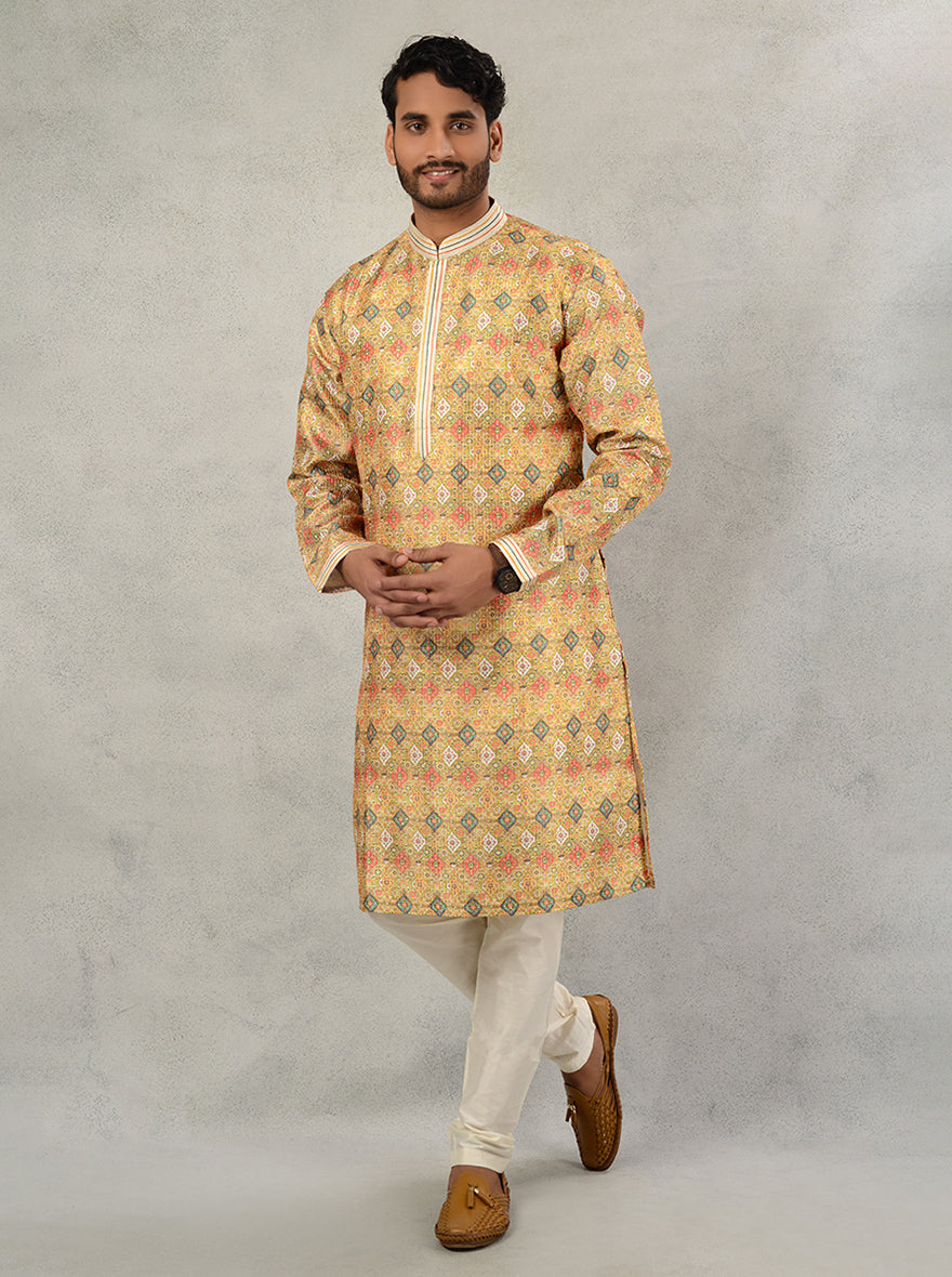 Step into style with this printed yellow kurta pajama, designed for modern celebrations and gatherings.