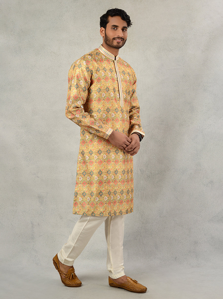 Silk blend yellow kurta pajama for men, ideal for pre-wedding events.