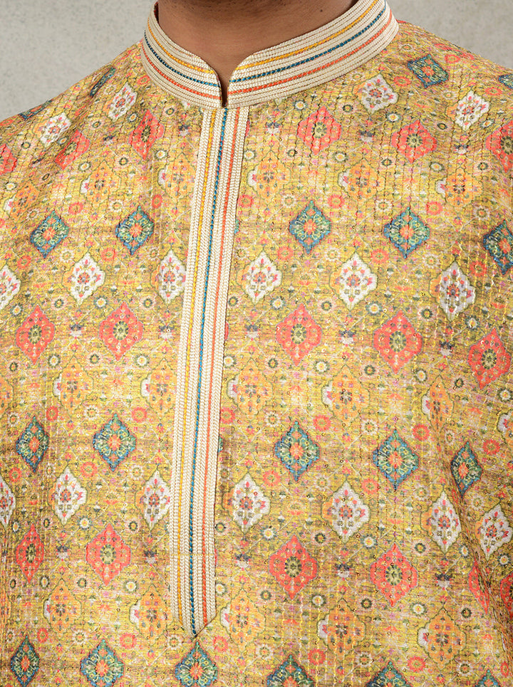 Stylish men's yellow kurta set, perfect for Haldi or festive occasions.