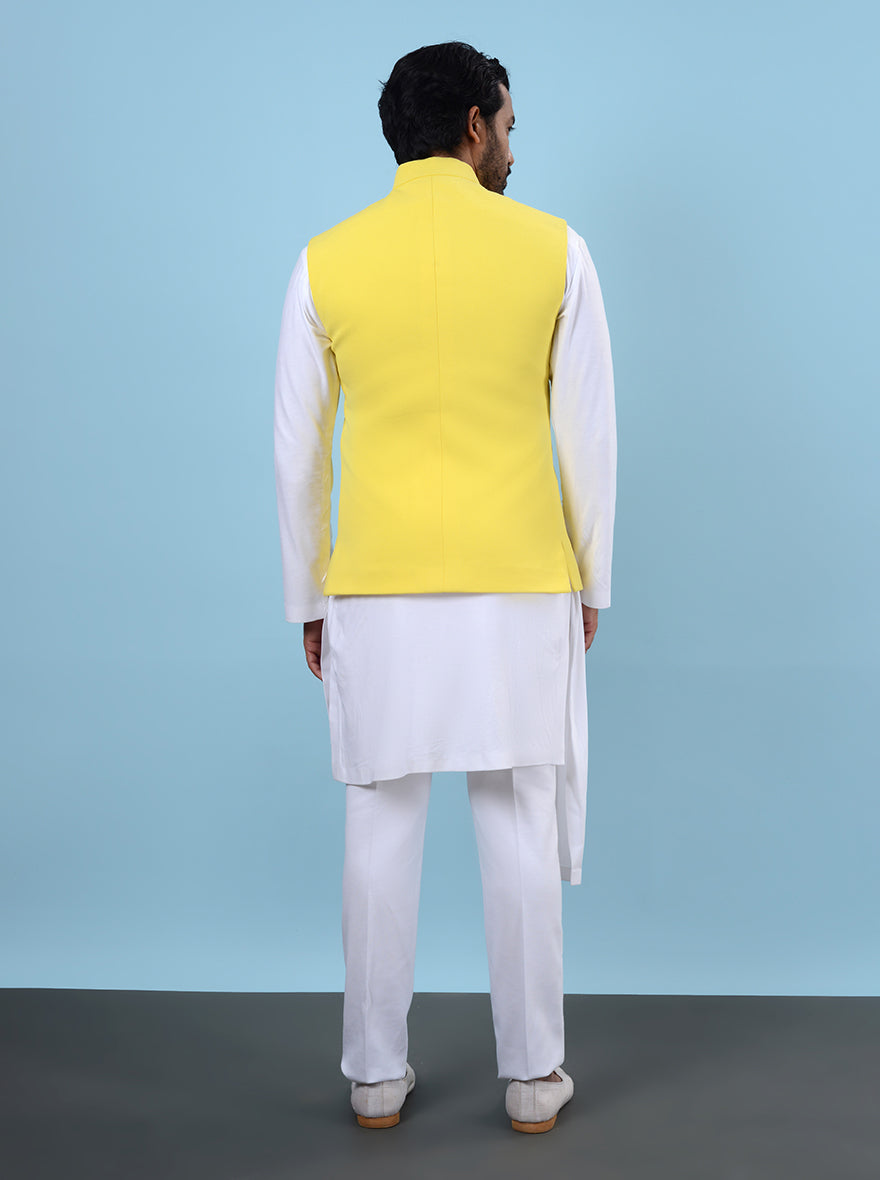 Make a statement at events with this chic Yellow & White Kurta Set featuring a trendy Koti.