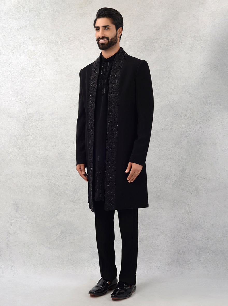 This elegant black sherwani features intricate embroidery, ensuring you stand out at any wedding celebration.