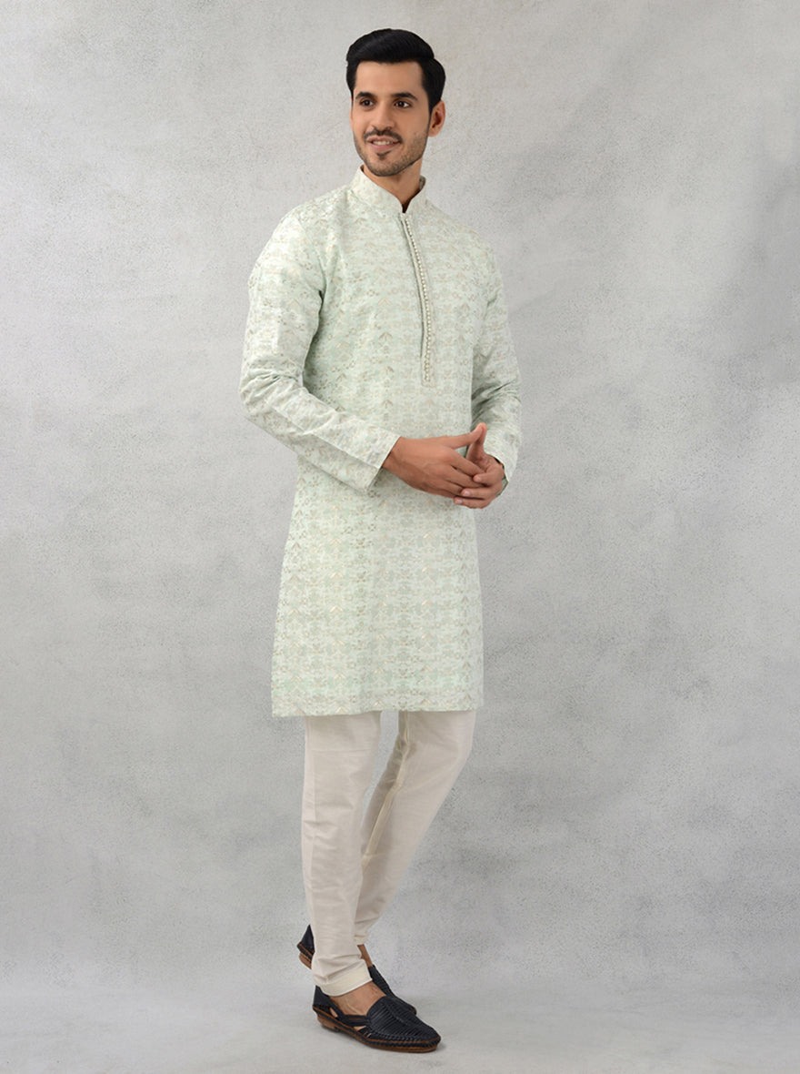 Pista green kurta set for men with self-textured silk jacquard, ideal for weddings and special gatherings.