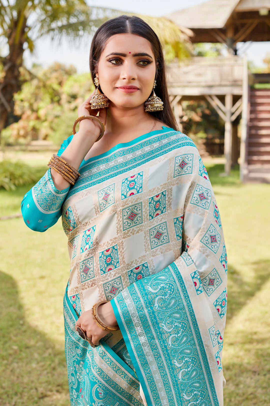 Luxurious sky-blue Kanjivaram soft silk saree with beautiful designer borders and intricate work.