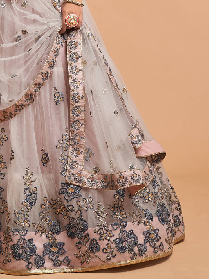 Soft net dupatta with sequins embroidery complementing the grey lehenga choli.