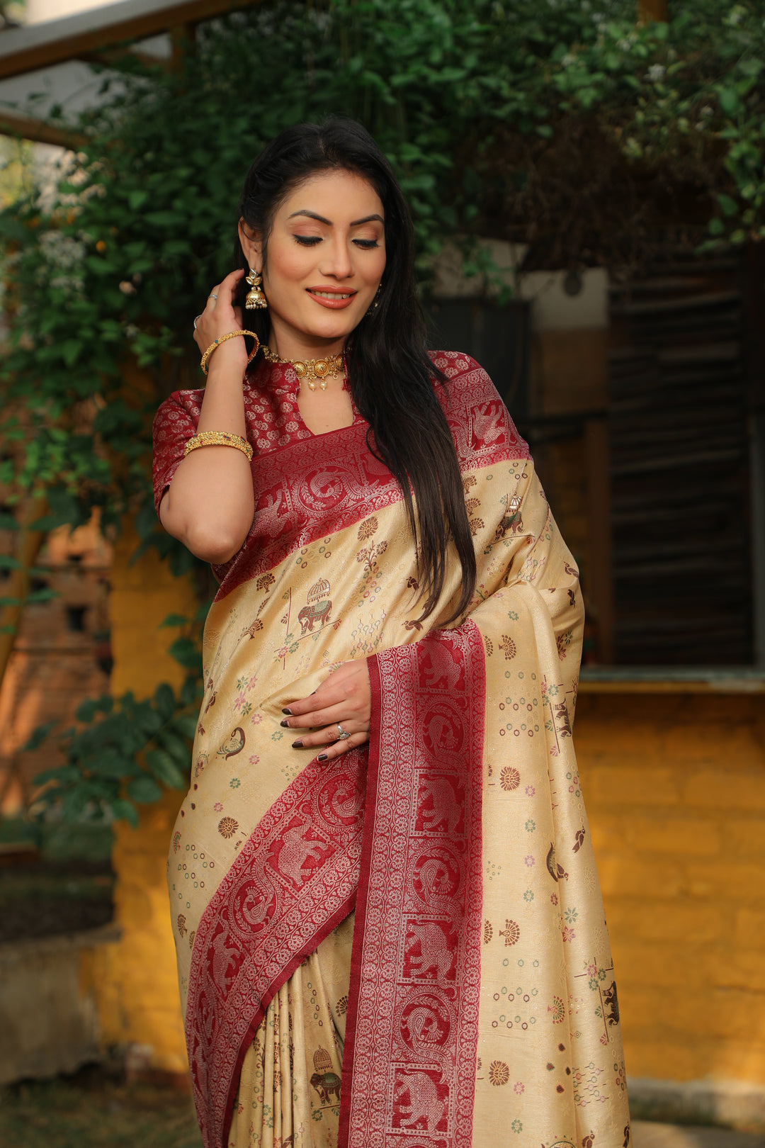 Classic cream Kanjivaram silk saree featuring beautiful weaving and traditional borders, ideal for weddings.