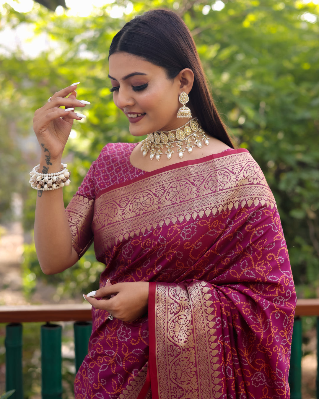 Elegant red Patola Silk Saree with intricate Zari design and Kanchi Borders, perfect for USA events.