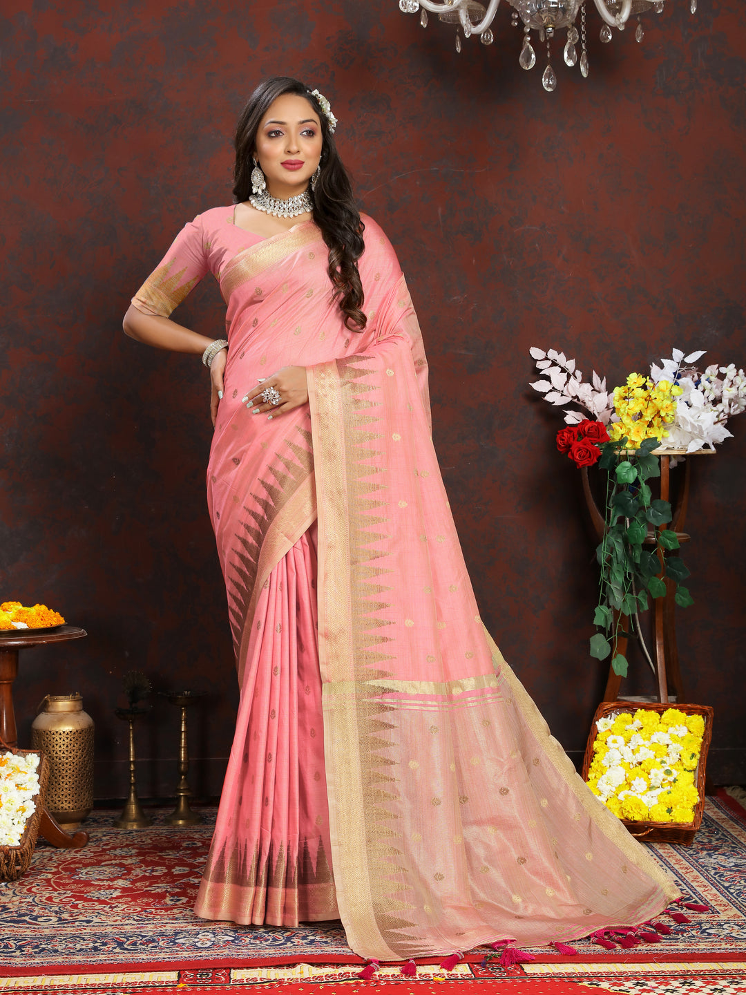 Beautiful Peach Silk Saree with rich zari weaving and exquisite pallu tassels for festive occasions.