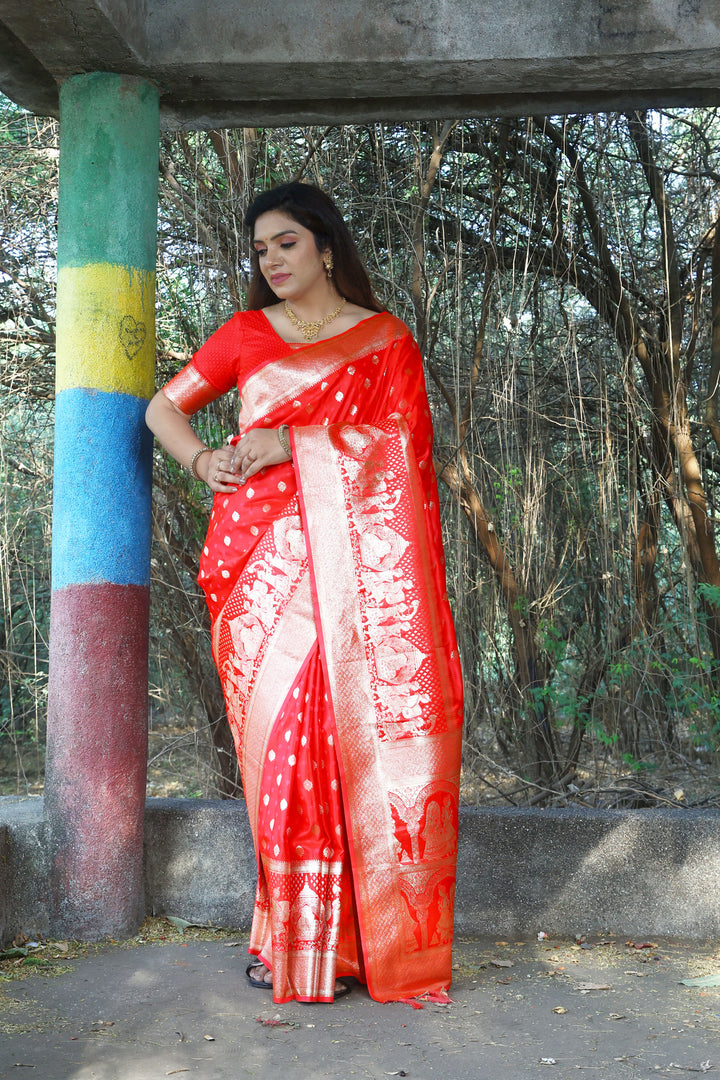 Elegant red satin silk saree featuring intricate Kanjivaram weaving, ideal for weddings and festive occasions.