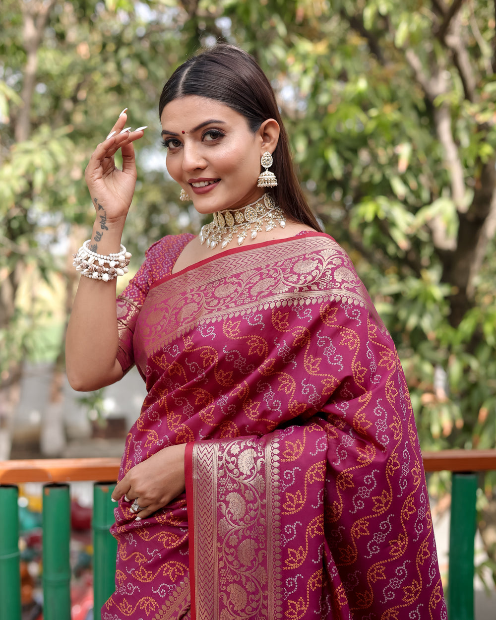 Elegant blue Bandhej Patola silk saree featuring delicate zari work and traditional Kanchi borders, ideal for celebrations.