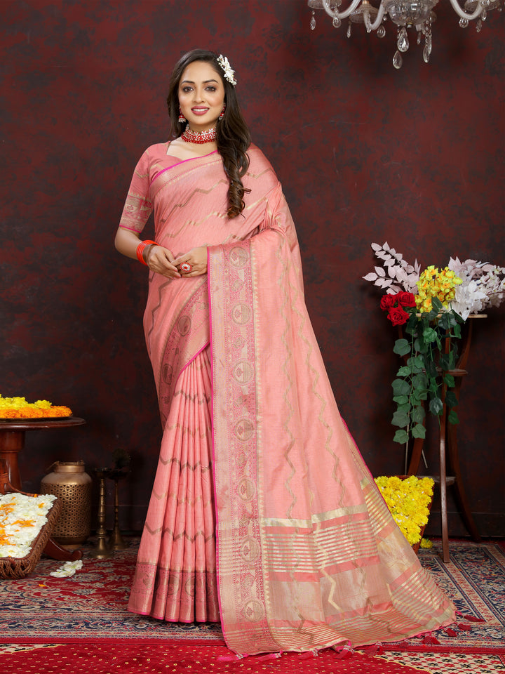 Elegant peach silk saree featuring luxurious zari weaving, ideal for festive occasions.