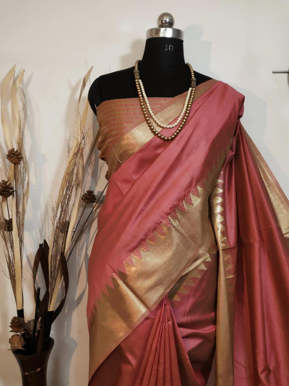 Peach Indian saree with intricate zari work, perfect for cultural attire at your next special occasion or festival.