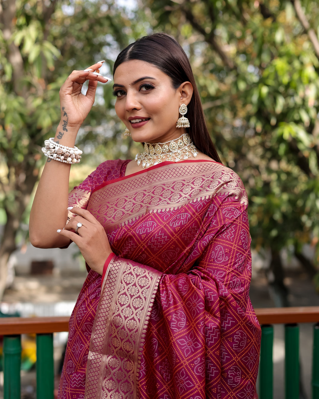 Elegant maroon saree with a rich woven pallu, combining heritage craftsmanship and modern style.