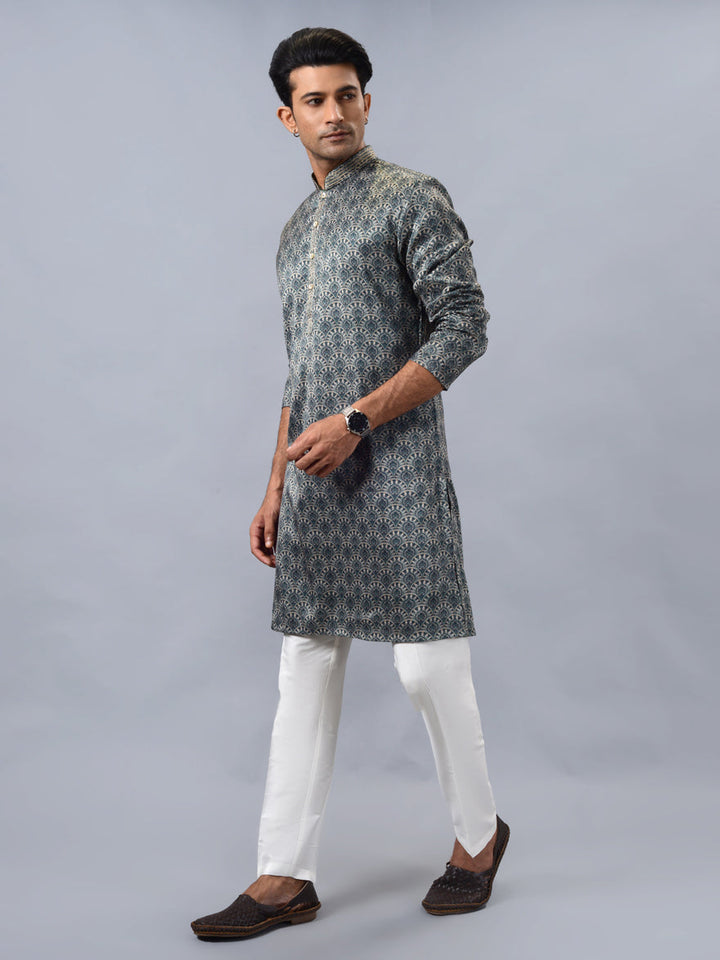 Comfortable green kurta pajama for men, ideal for weddings, cultural gatherings, and pooja.