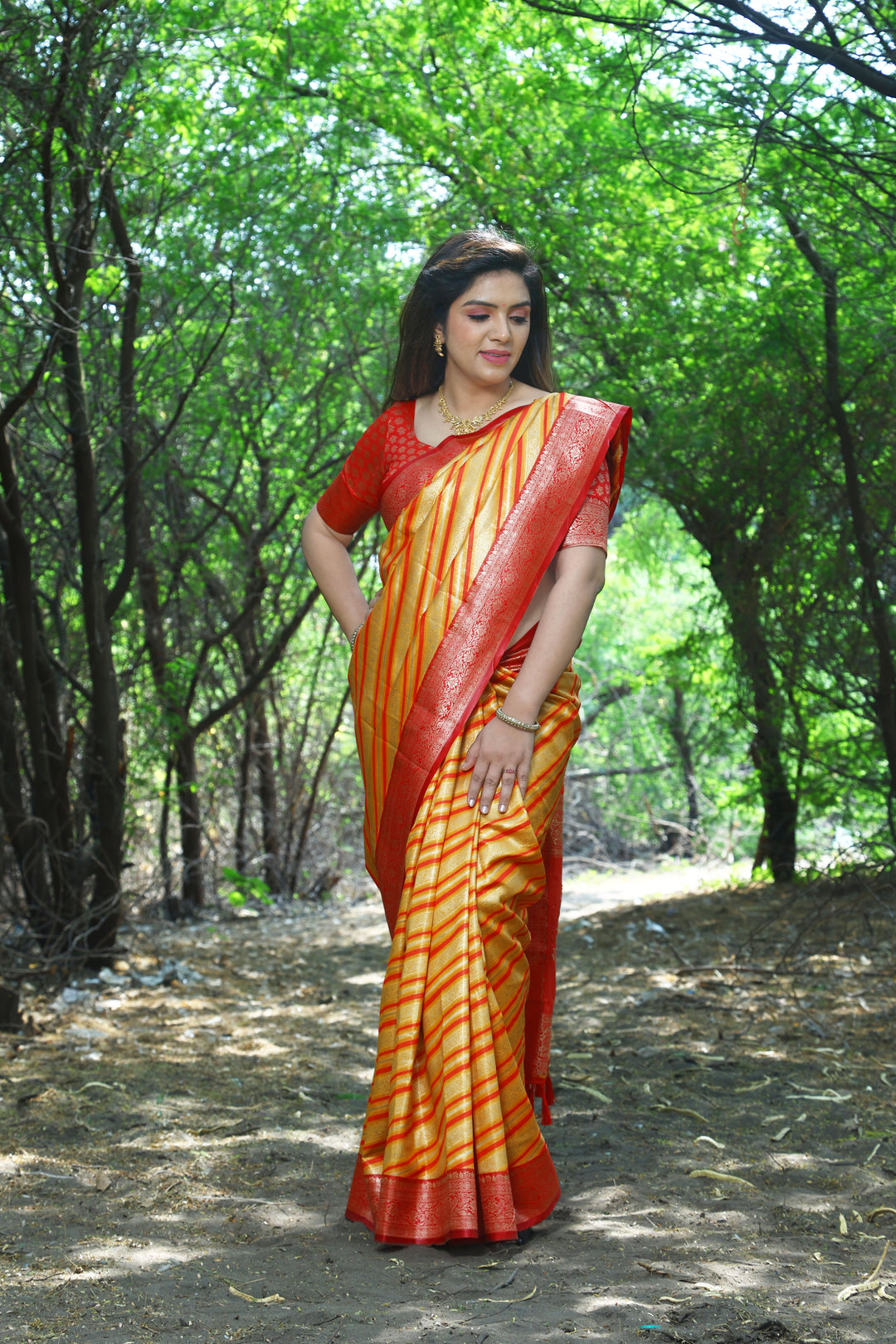 Elegant Yellow Leheriya Soft Silk Saree featuring Zari woven design and beautiful border, perfect for festive occasions.