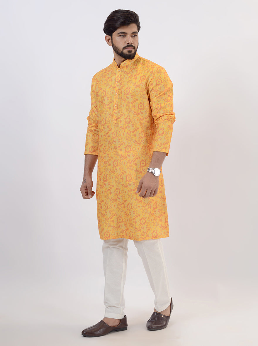 Vibrant mustard yellow kurta pajama set for men, ideal for ethnic wear.