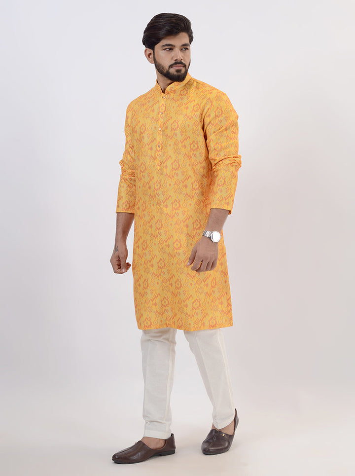 Vibrant mustard yellow kurta pajama set for men, ideal for ethnic wear.