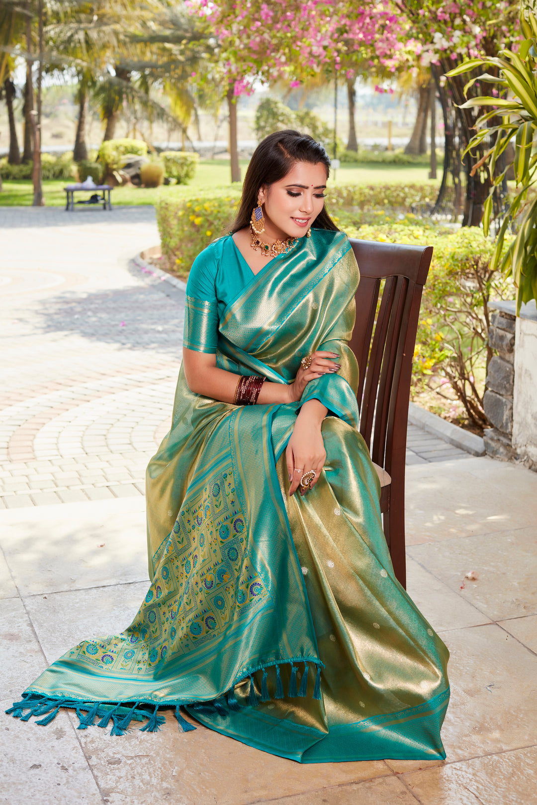 Timeless green tissue silk saree featuring intricate design, rich pallu, and contrasting blouse, ideal for weddings.