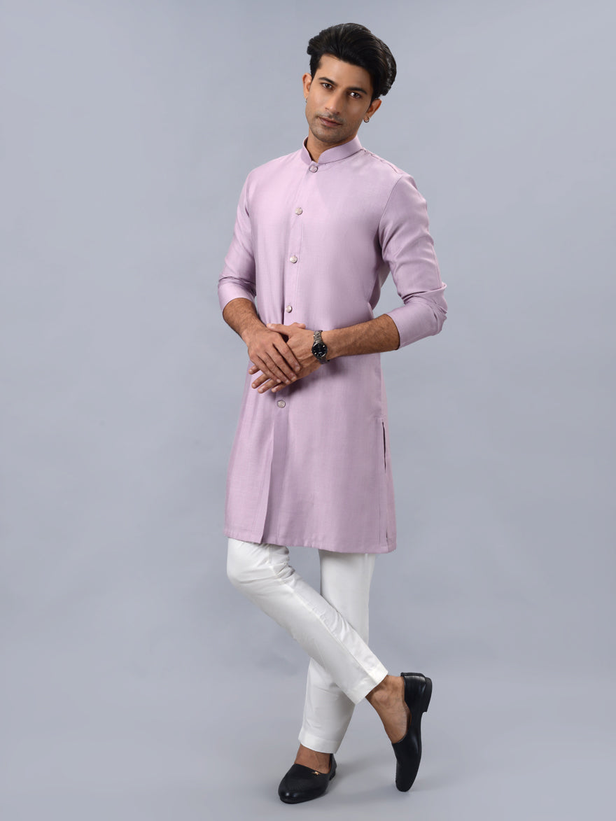 Elegant pink ethnic kurta pajama for men, ideal for traditional ceremonies and parties.