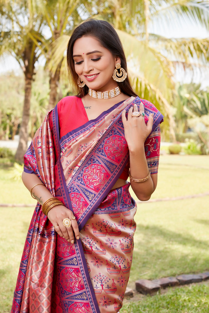 Stunning pink Kanjivaram silk saree with intricate detailing and a shimmering finish, ideal for weddings and cultural occasions.