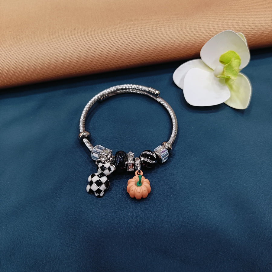 Enchanting Pandora bracelet featuring delicate charms, ideal for layering with other bracelets.