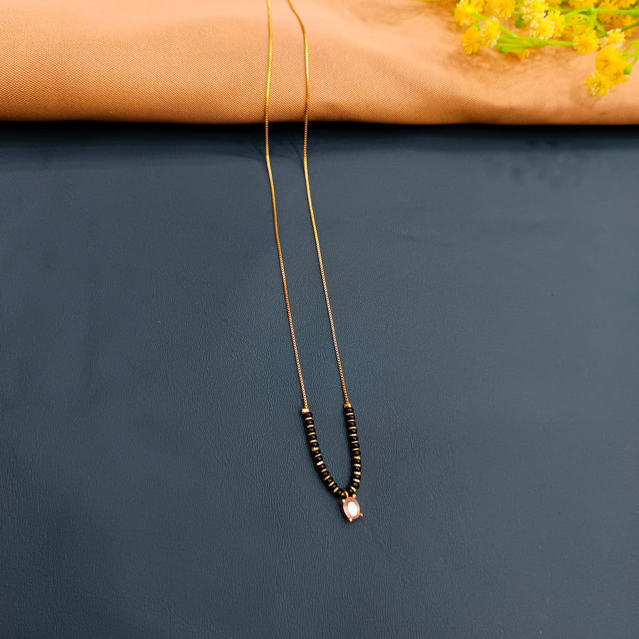 Elegant black and gold mangalsutra, high-quality alloy, traditional design.