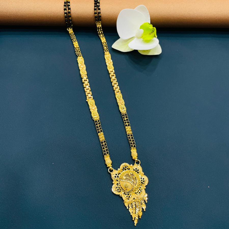 Black and gold mangalsutra, crafted from premium alloy with gold plating.