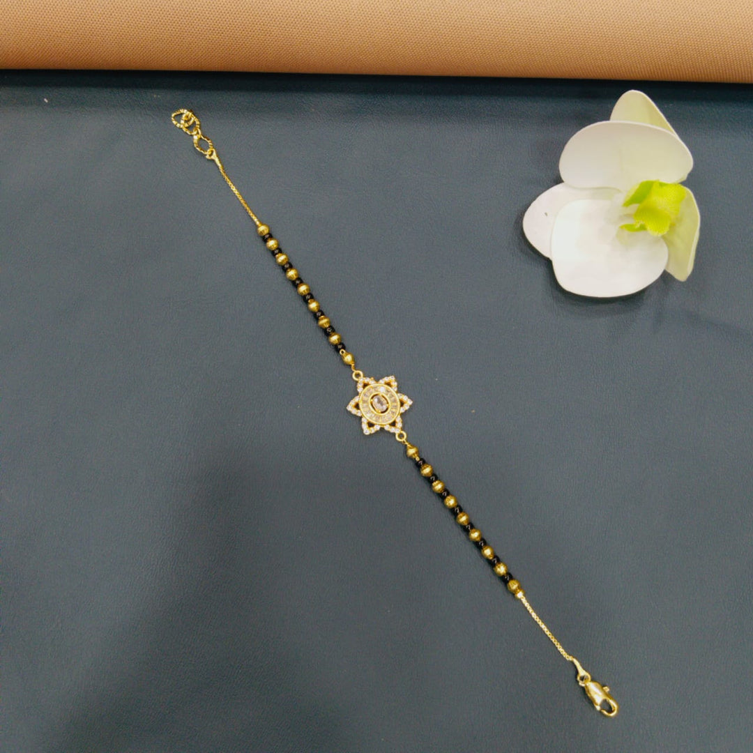 Sophisticated golden bracelet for casual elegance.