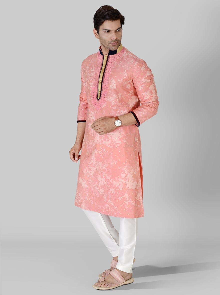 Unique pink silk kurta pajama designed for style and sophistication during celebrations.