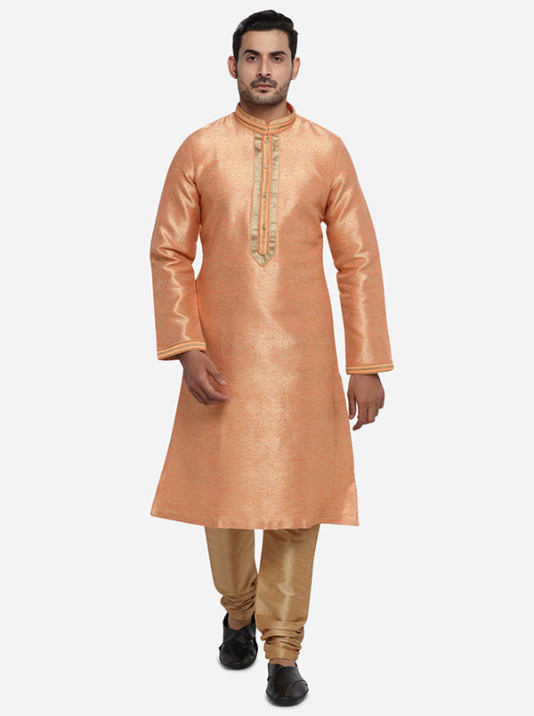 Elevate your ethnic collection in the USA with this stylish self-design peach and golden kurta set.