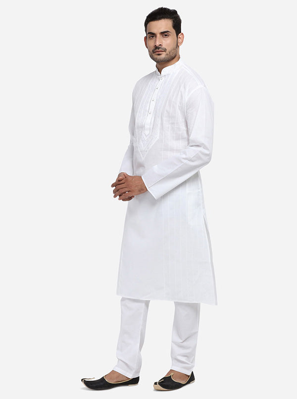 White kurta set with stripes, combining comfort and quality for festive wear in the USA.