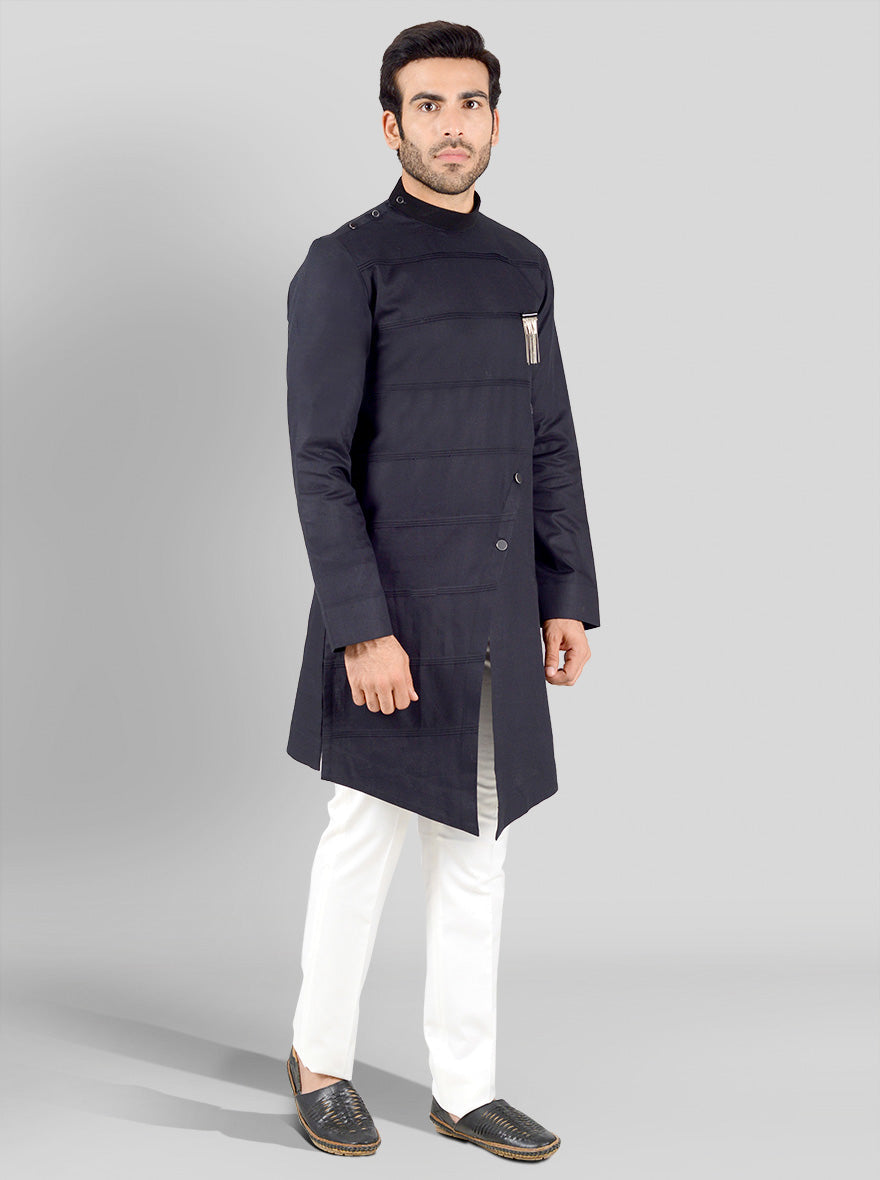 Comfortable black kurta with a modern touch, featuring a banded collar and button placket, suitable for traditional events.