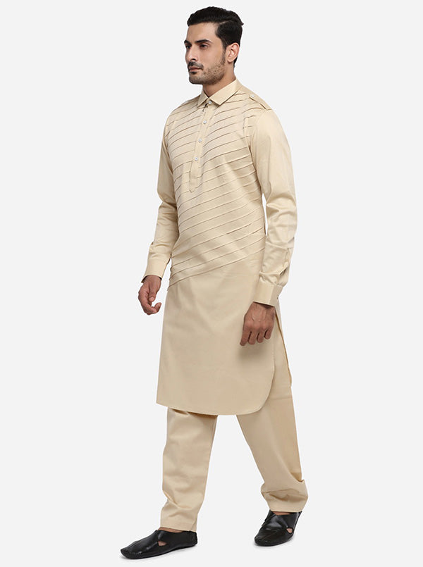 Beige Pathani kurta set for men, crafted with comfort and stylish details for all-day outings.