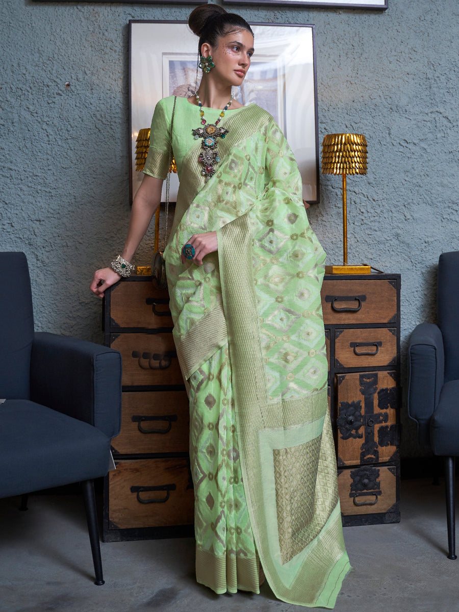 Green silk saree crafted for elegance and style.