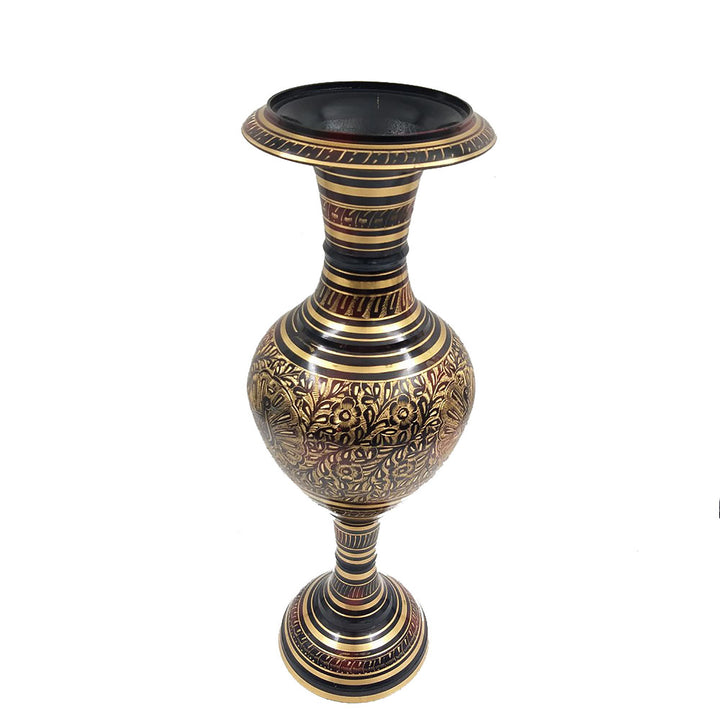 Ornate black and gold brass pot with exquisite peacock engravings, a stunning addition to any decor.