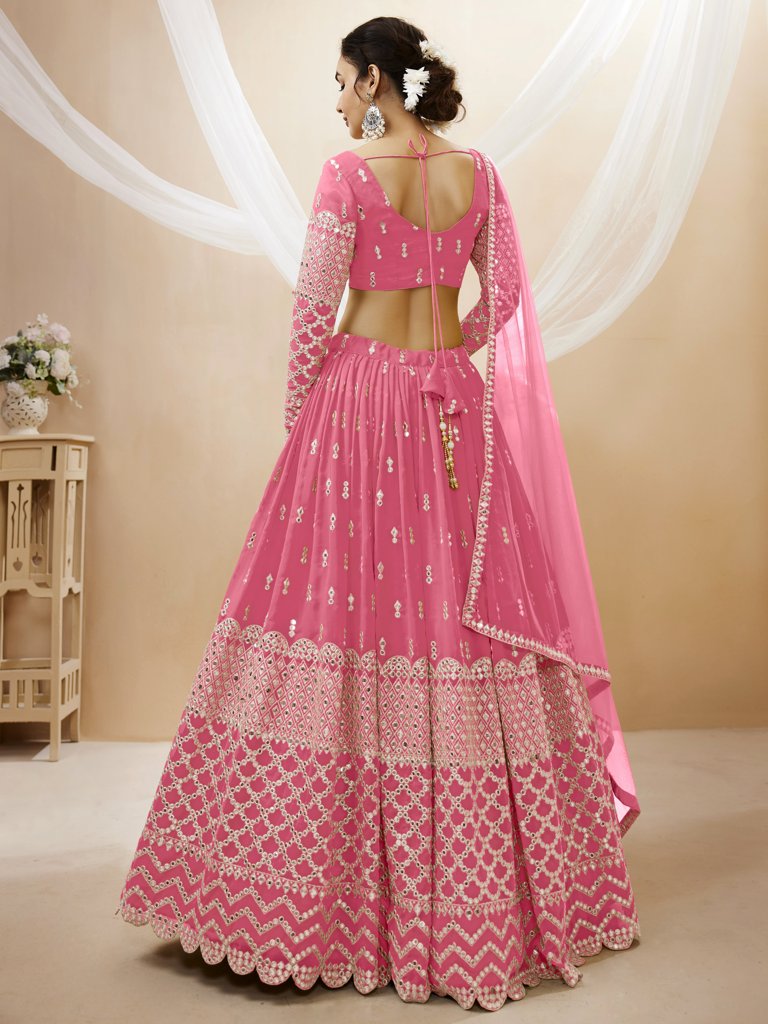 Beautiful pink lehenga choli set in georgette fabric with exquisite sequins and zari work, perfect for special events.