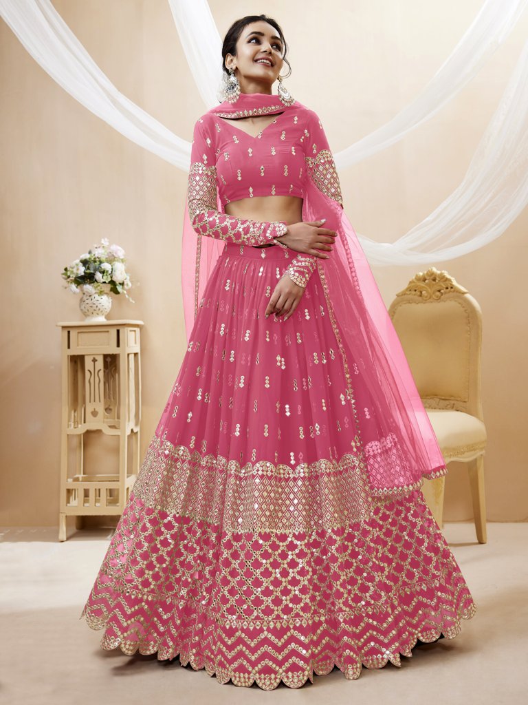 Traditional pink georgette lehenga set with sequins detailing and zari work, ideal for cultural celebrations.