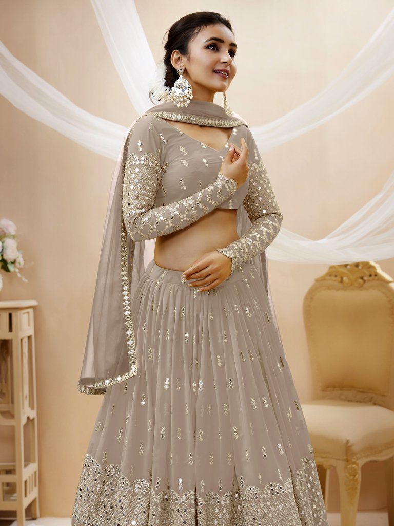 Stunning grey georgette lehenga set featuring sequins and zari embroidery for a luxurious look.