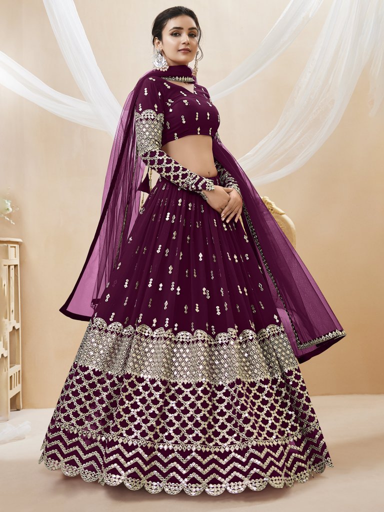 Gorgeous wine lehenga choli in georgette with delicate sequins and zari work, ideal for festive occasions.